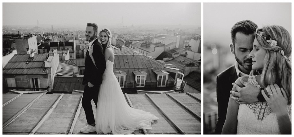 couple holding each other in front of paris rooftop and eiffel tower